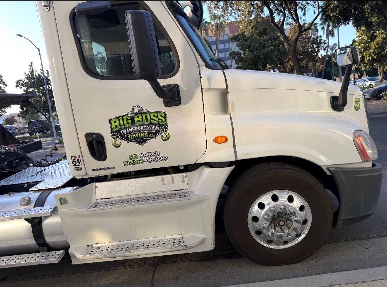 Big Boss truck cab with company logo on the door